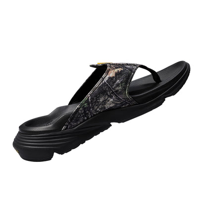PCSsole men's thong sandal with a thick black platform sole and a camouflage-patterned upper strap.